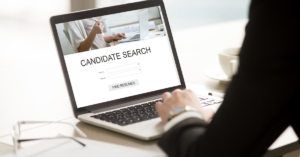 Job recruiting looking at candidate search screen on computer